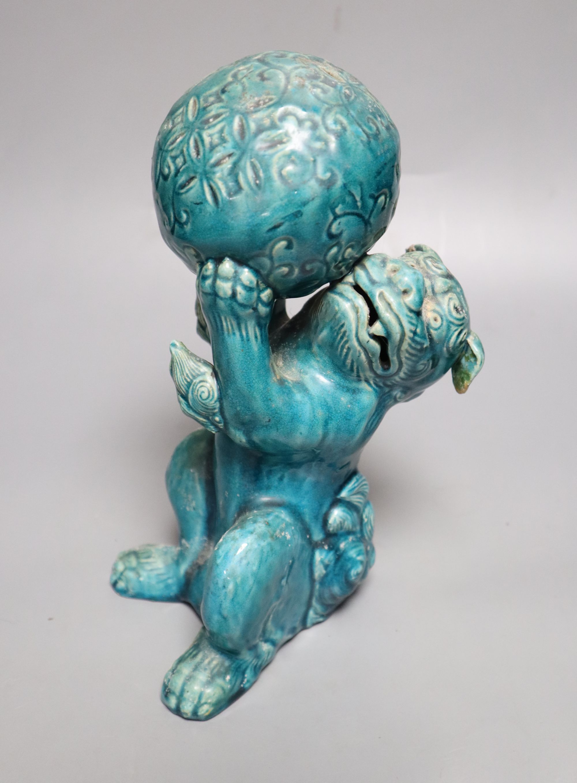 A Japanese turquoise glazed shi-shi, height 24cm